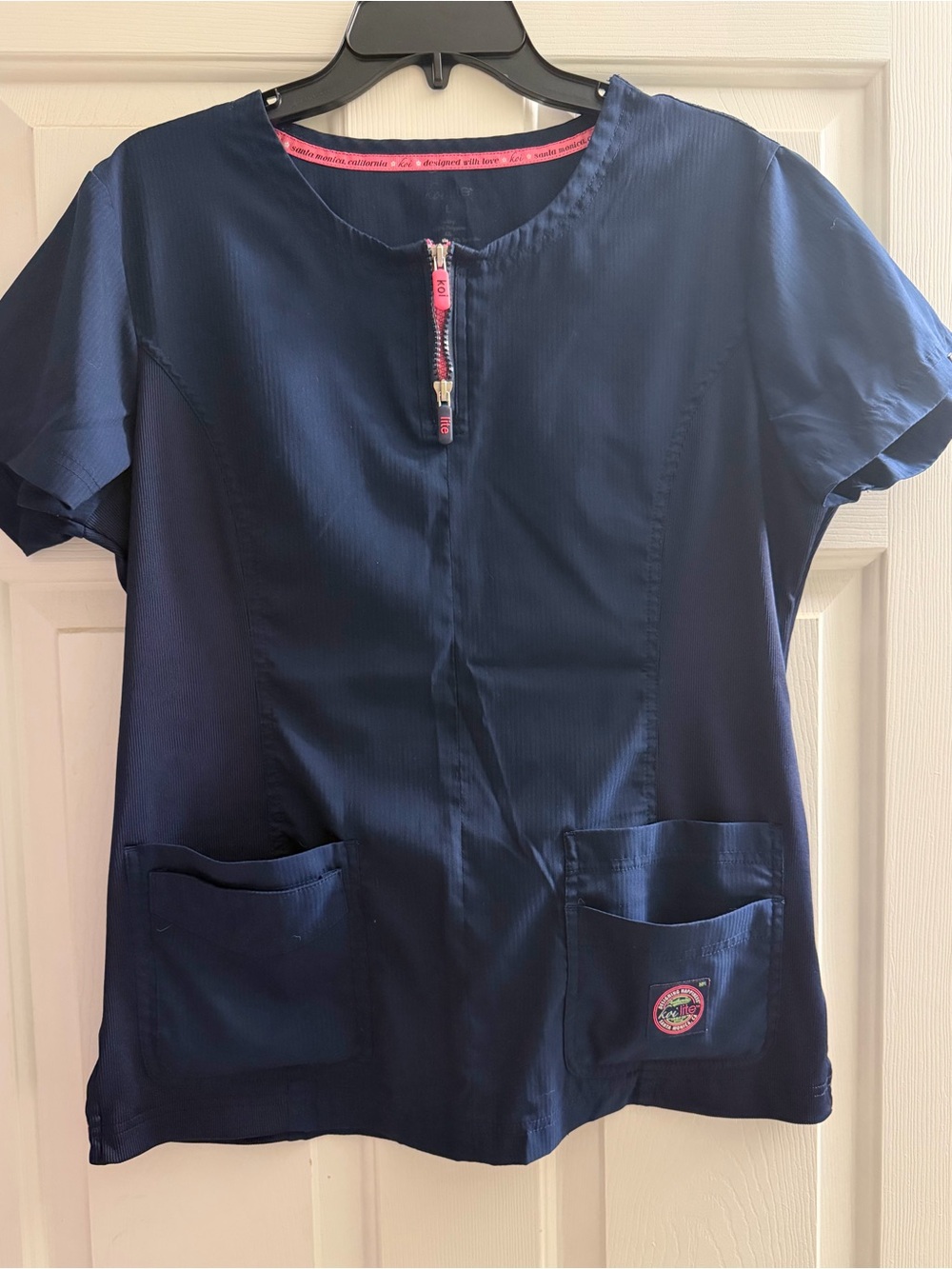 koi Women's Navy Short Sleeve Scrub Top with Pink Zip Accent